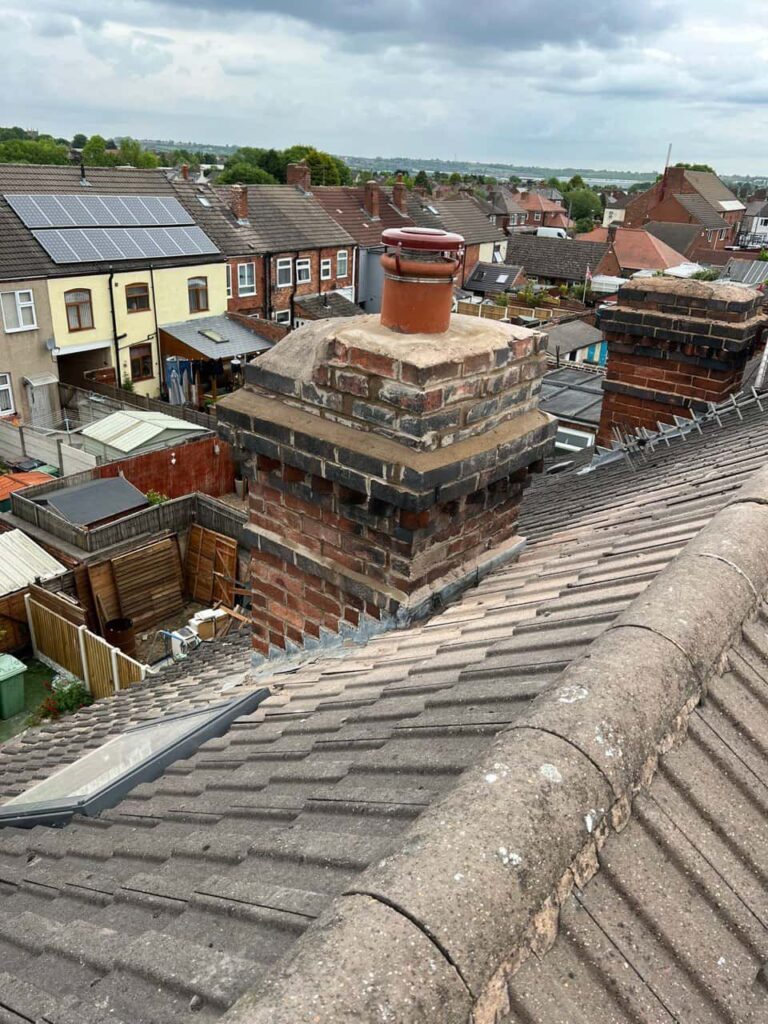 This is a photo taken from a roof which is being repaired by Hayling Island Roofing Repairs, it shows a street of houses, and their roofs